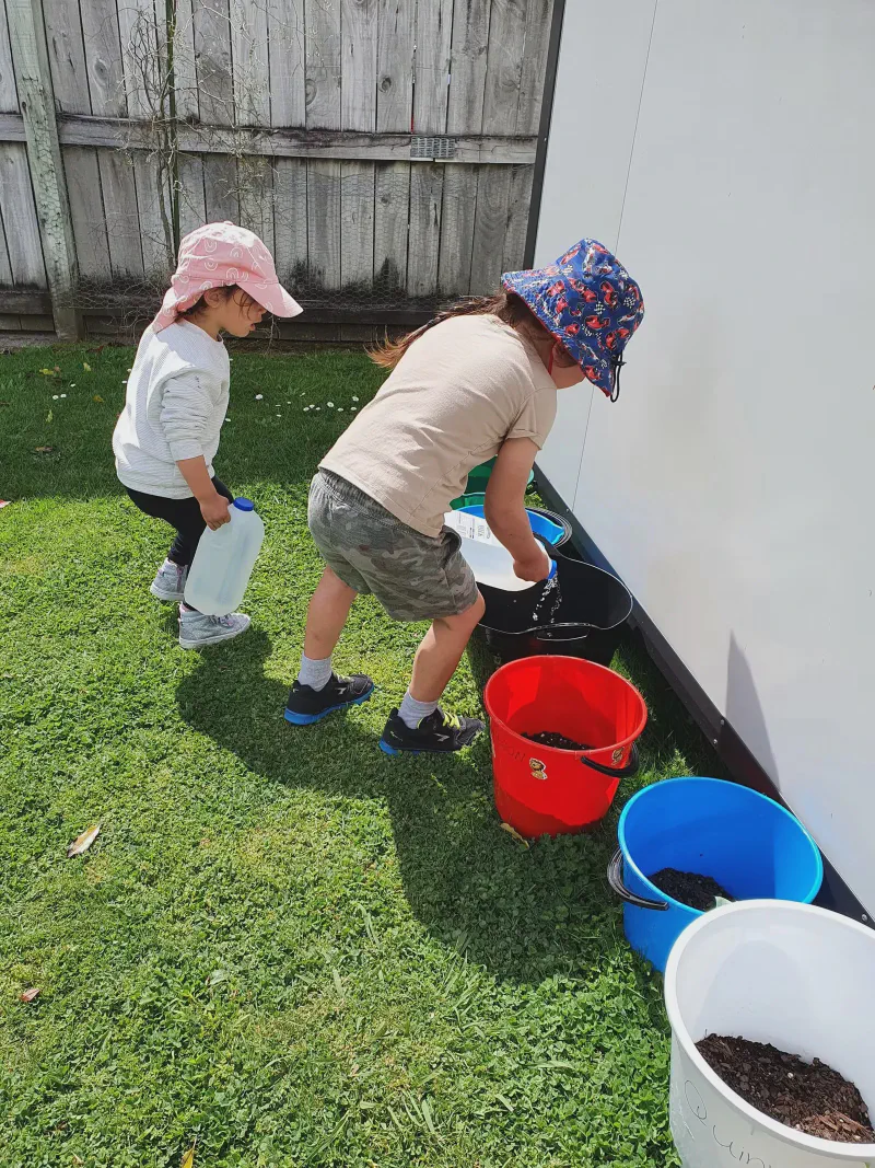 Children gardening together