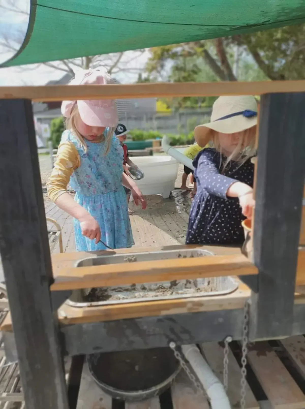 Children at the play kitchen area